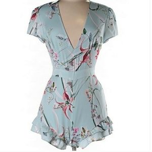 Bebe size 10 floral ruffle romper